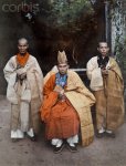 1931, Vietnam --- Two bonzes of Hue stand beside an Annamite priest.jpg