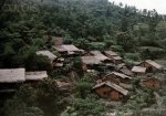 1931, Tonkin, Vietnam --- A view of the thatched mud huts of the Tho people in the wooded hills.jpg
